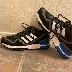 Adidas shoes. Blue, black and white.